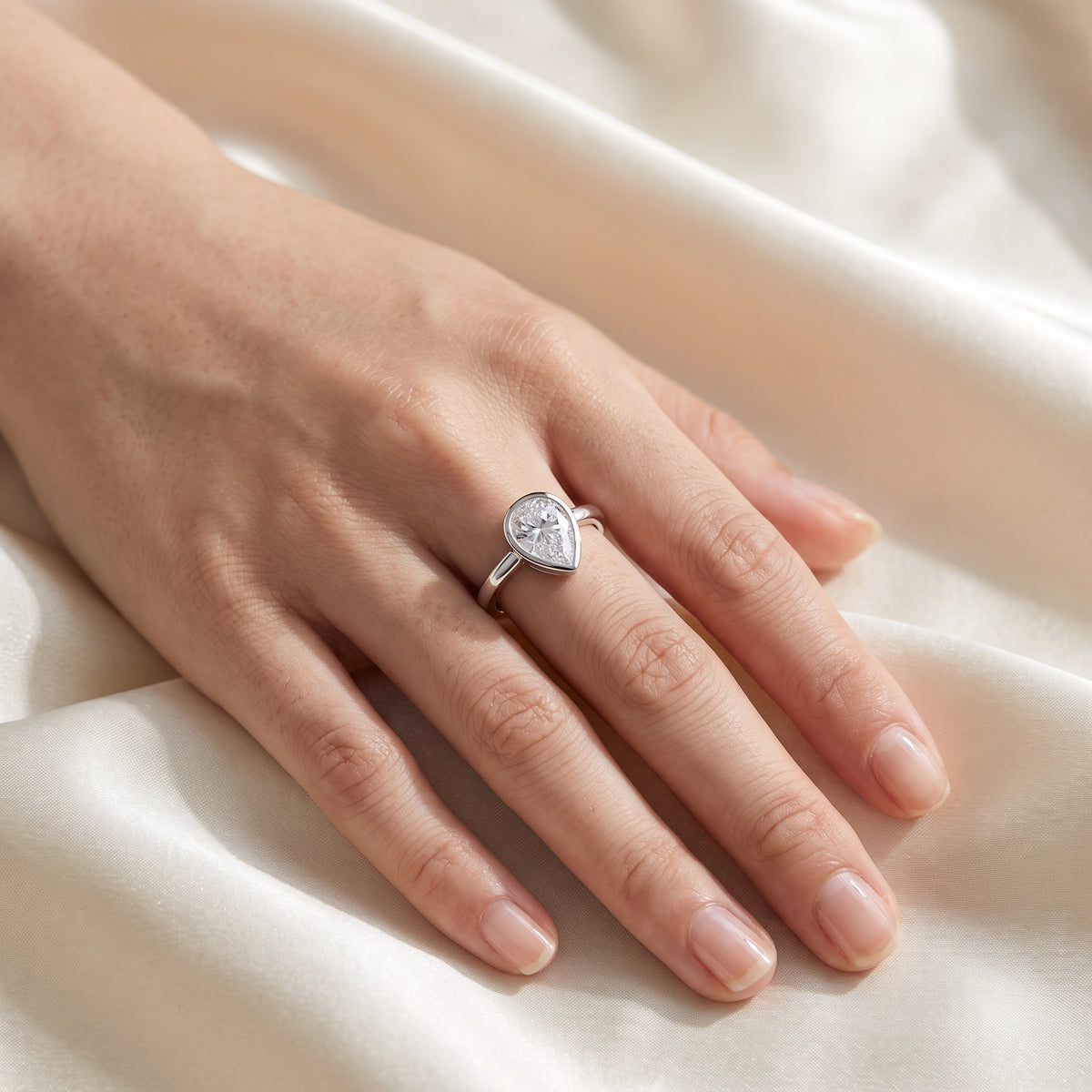 Goccetta Pear-Cut Moissanite Solitaire Ring