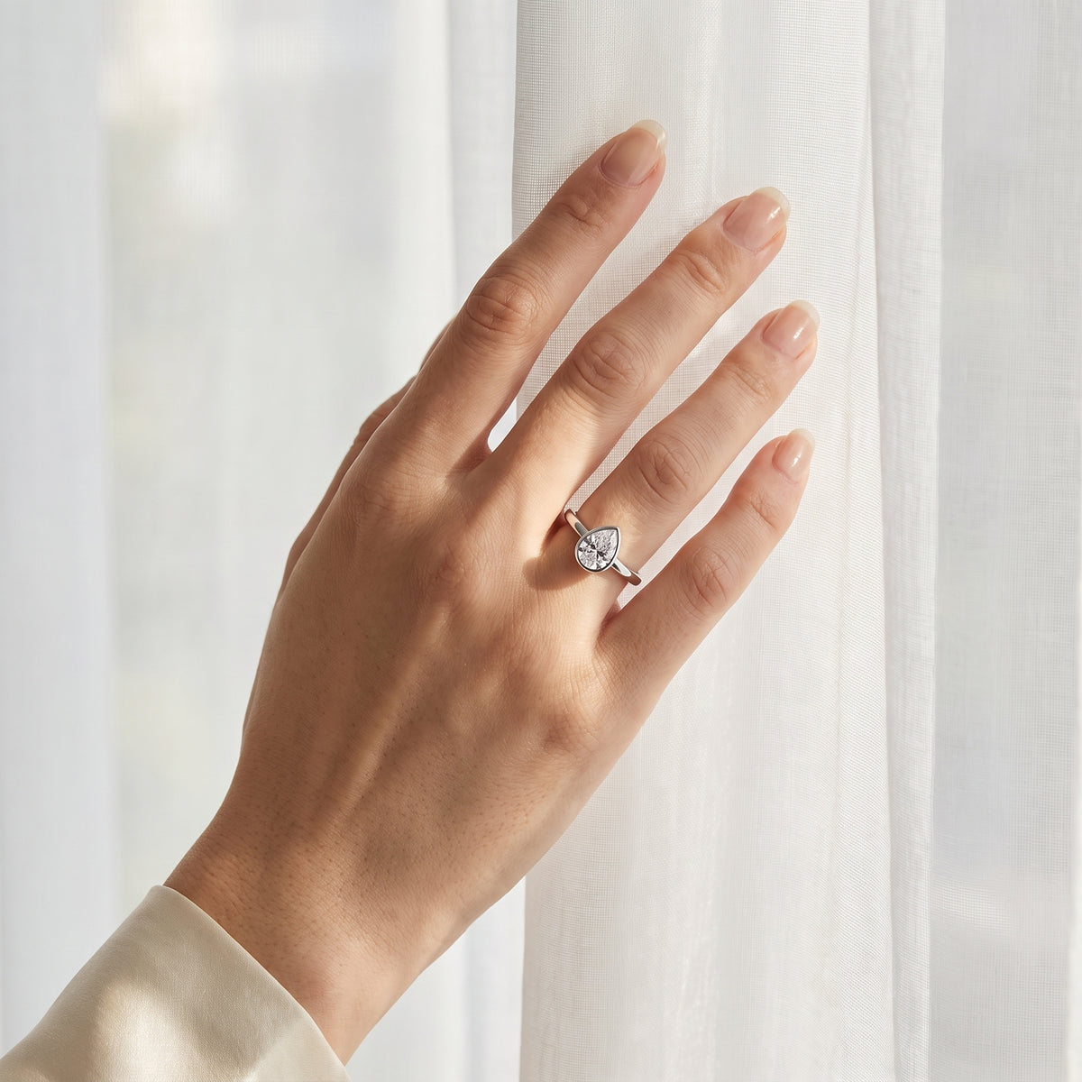 Goccetta Pear-Cut Moissanite Solitaire Ring